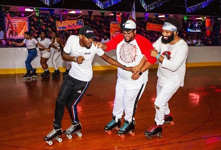 three black men skating