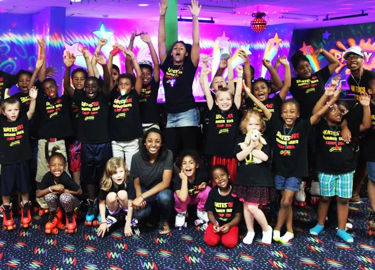 2014 summer skate camp group posing for picture