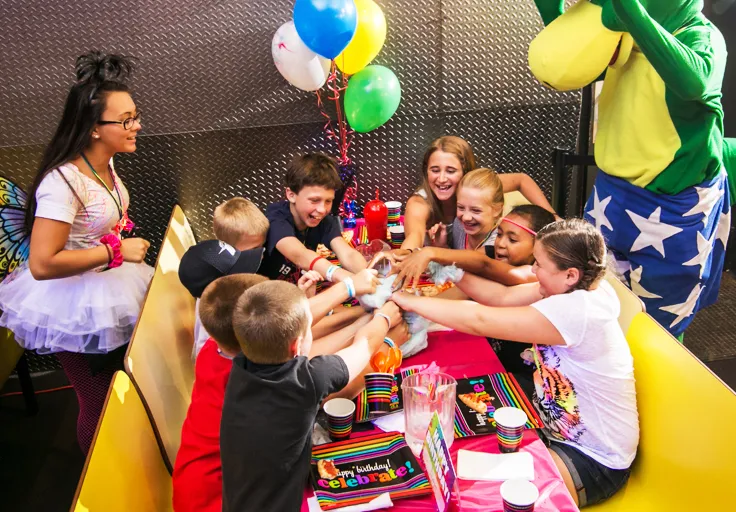 birthday group of kids grabbing cotton candy