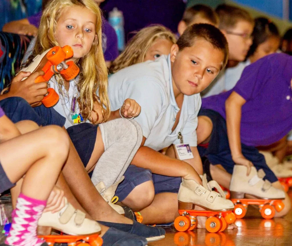 Kids learning about STEM projects at a skating rink