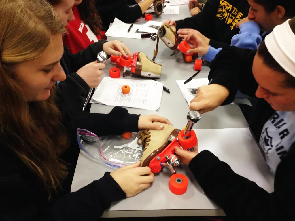stem group takes apart a roller skate with a ratchet